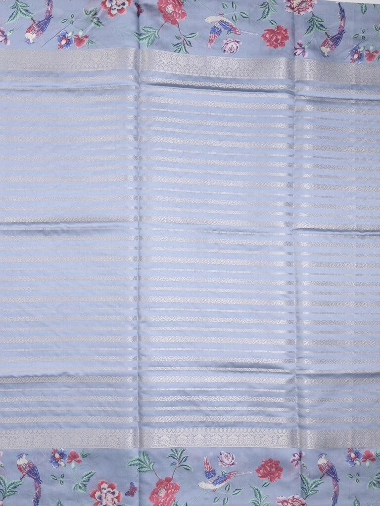 Dupion fancy saree light blue color allover stripes & printed border with printed pallu and printed blouse