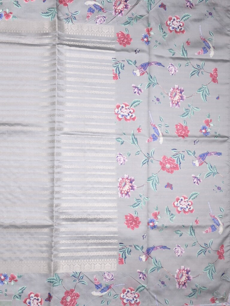 Dupion fancy saree grey color allover stripes & printed border with printed pallu and printed blouse