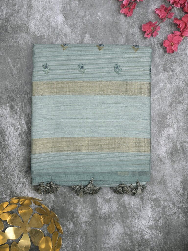 Tussar fancy saree bluish grey color allover prints & small kaddi border with printed pallu and attached plain blouse