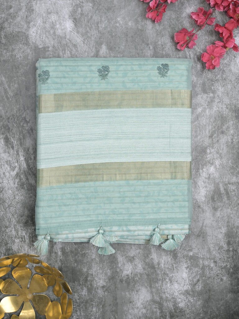 Tussar fancy saree light blue color allover prints & small kaddi border with printed pallu and attached plain blouse