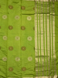 Dupion fancy saree parrot green color allover motifs & zari border with zari pallu and brocade blouse