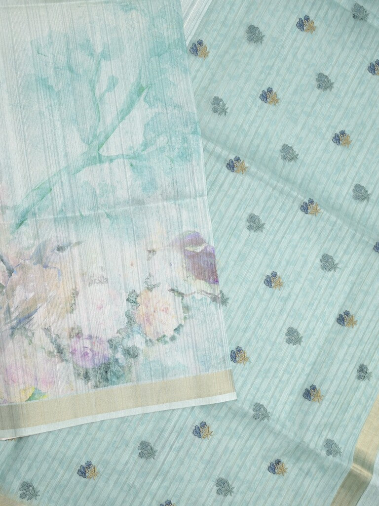 Tussar fancy saree light blue color allover prints & small kaddi border with printed pallu and attached plain blouse