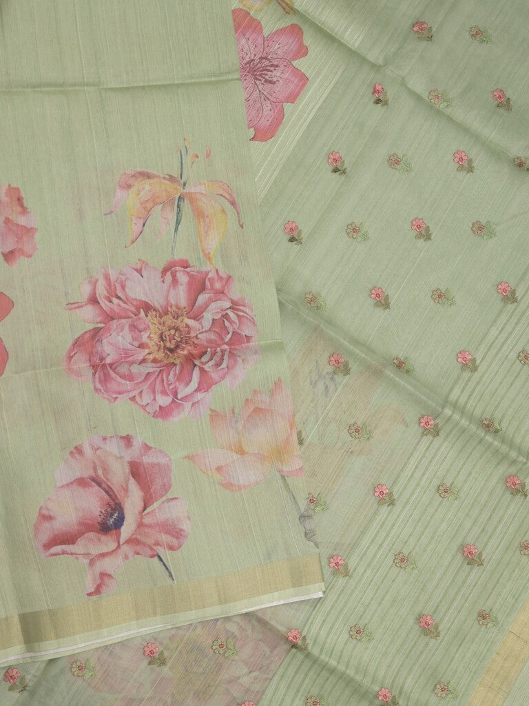 Tussar fancy saree light pista green color allover prints & small kaddi border with printed pallu and attached plain blouse