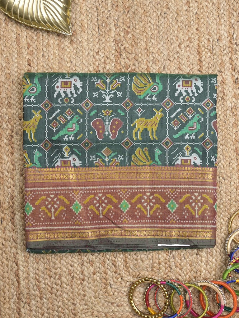 Ikkath fancy saree in peacock blue color allover design with zari border & ikkath pallu and plain blouse