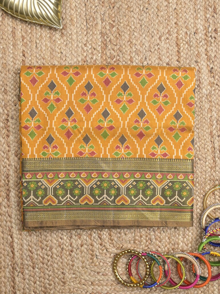 Ikkath fancy saree in golden yellow color allover design with zari border & ikkath pallu and plain blouse