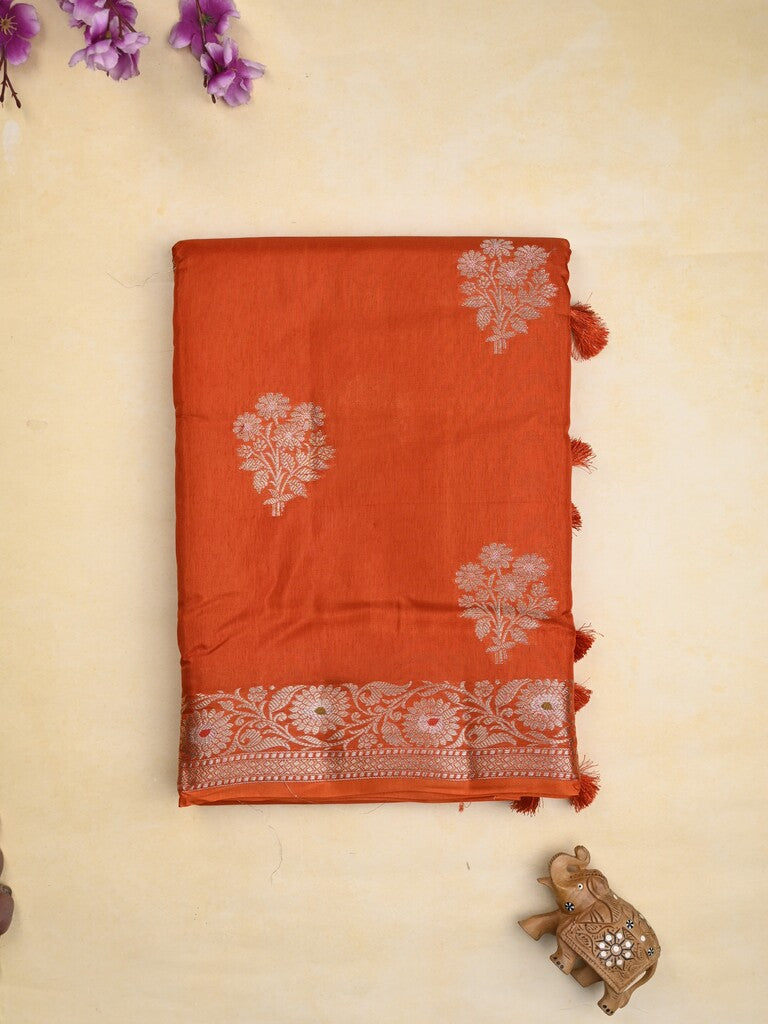 Raw mango fancy saree orange color allover zari motifs & zari border with zari pallu and brocade blouse
