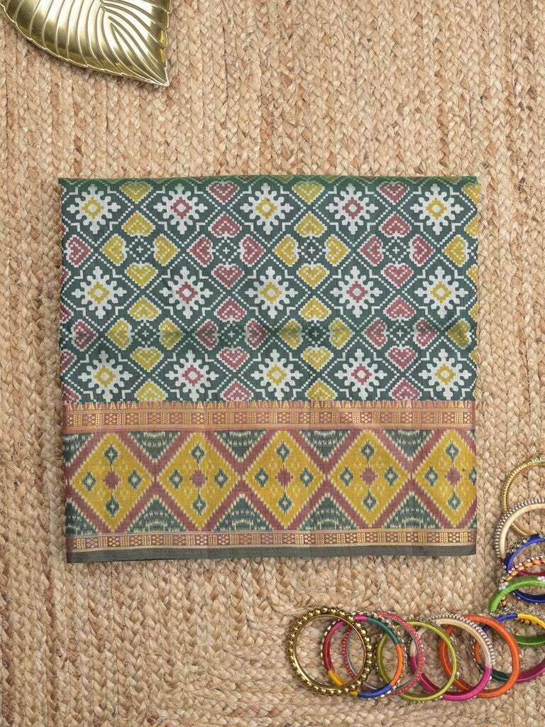 Ikkath fancy saree in dark green color allover design with zari border & ikkath pallu and plain blouse