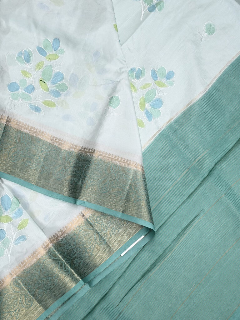 Mashru silk fancy saree pastel blue color allover prints & zari border with plain pallu and printed blouse