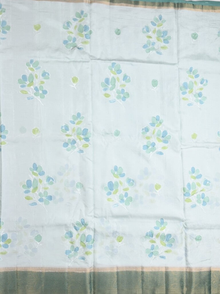 Mashru silk fancy saree pastel blue color allover prints & zari border with plain pallu and printed blouse