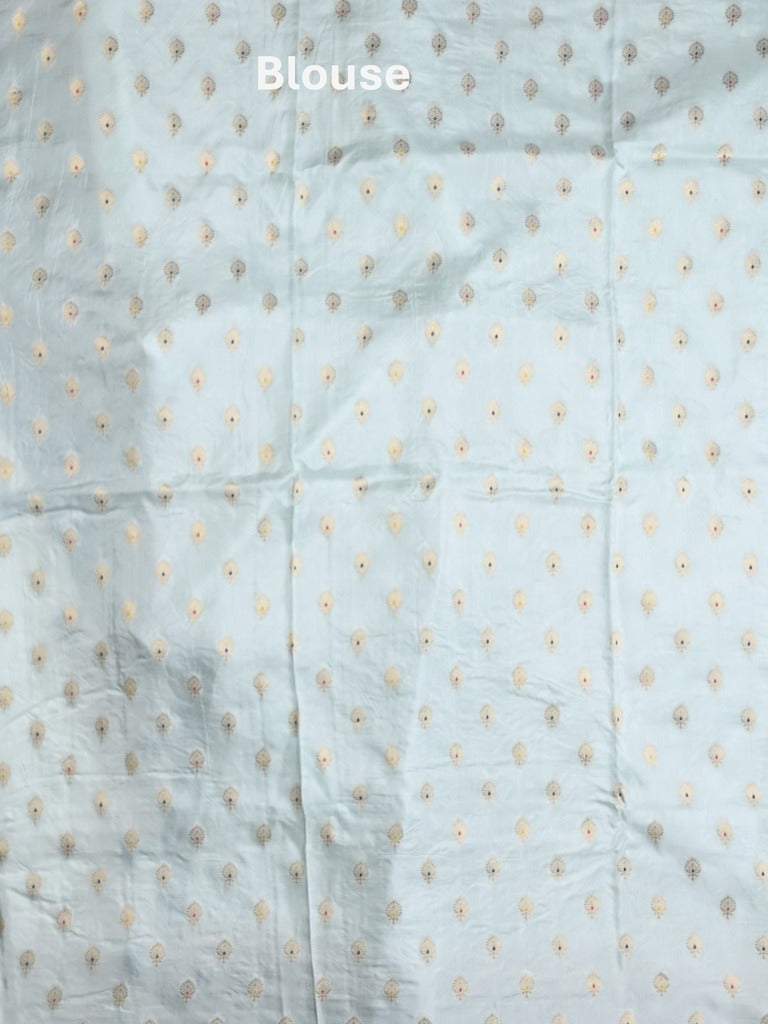 Mashru silk fancy saree pastel blue color allover prints & zari border with plain pallu and printed blouse