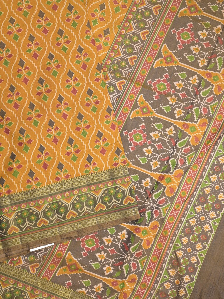 Ikkath fancy saree in golden yellow color allover design with zari border & ikkath pallu and plain blouse