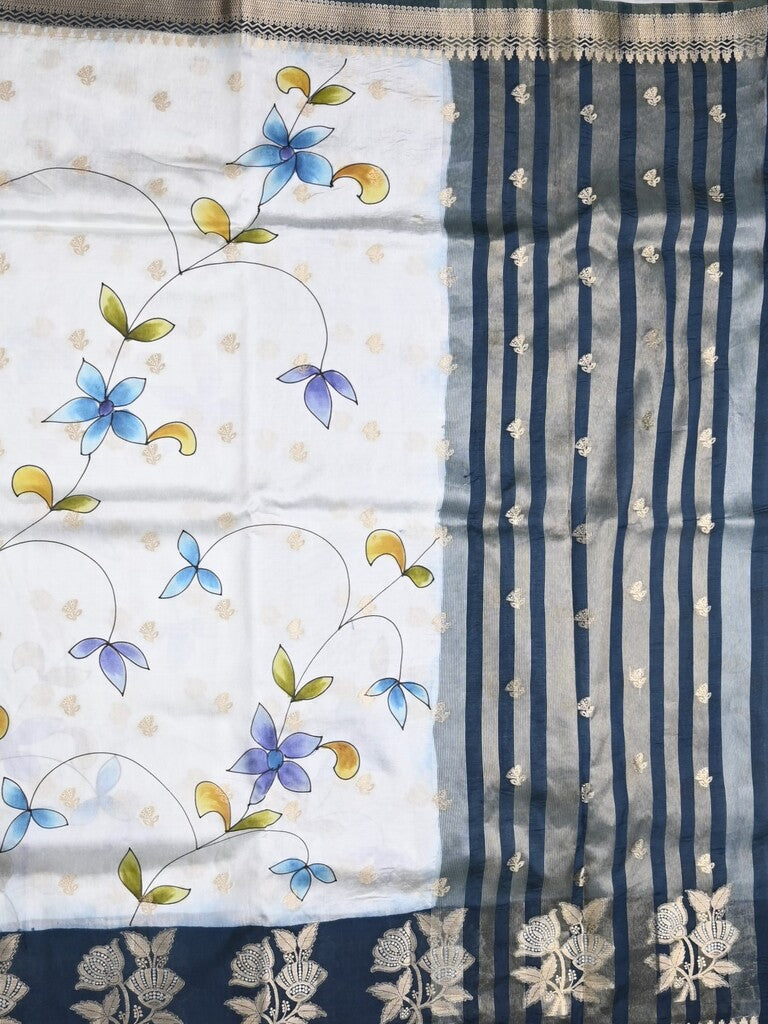 Raw mango fancy saree half white color allover prints & zari border with zari pallu and contrast blouse