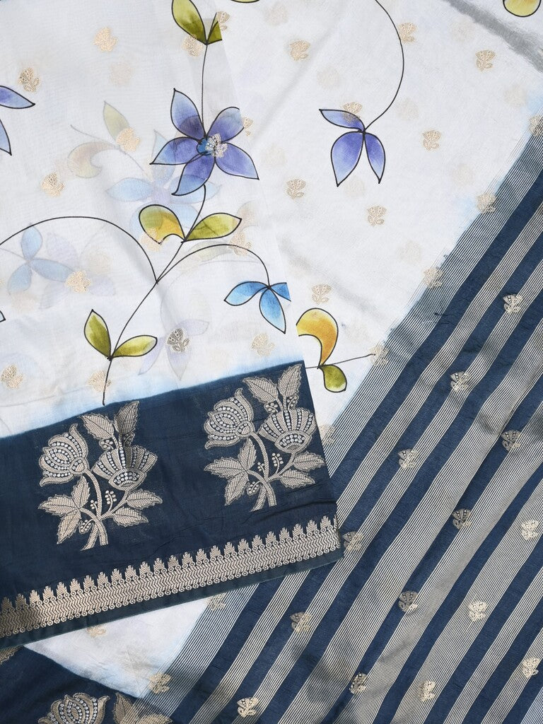 Raw mango fancy saree half white color allover prints & zari border with zari pallu and contrast blouse