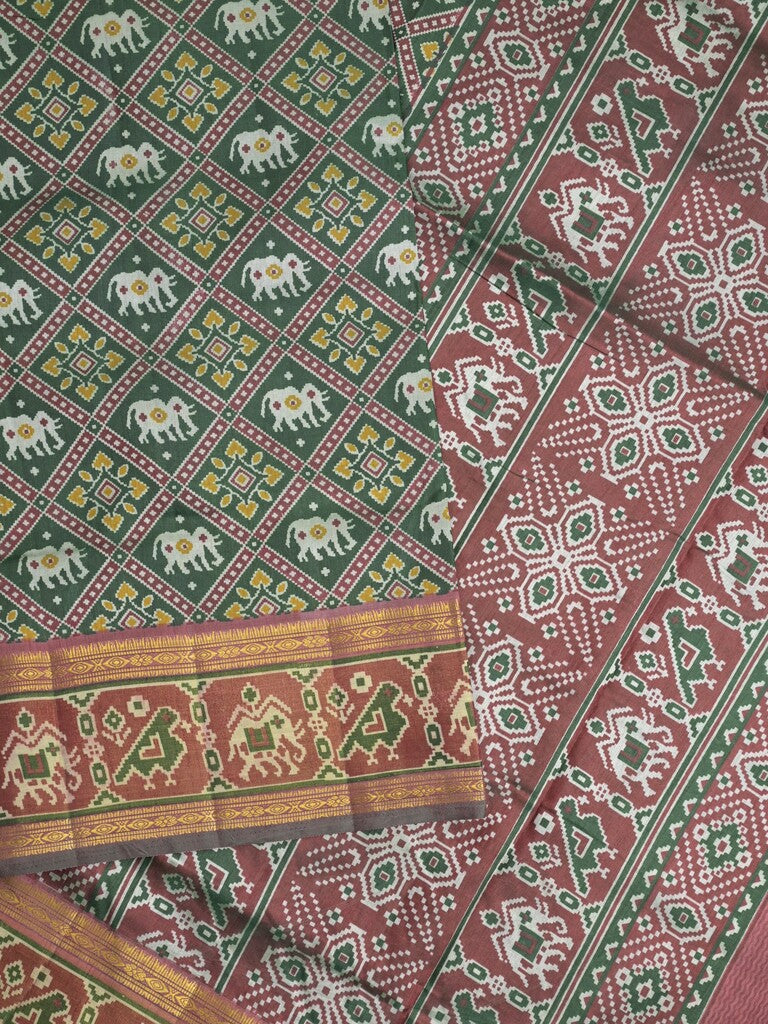 Ikkath fancy saree in dark green color allover design with zari border & ikkath pallu and plain blouse