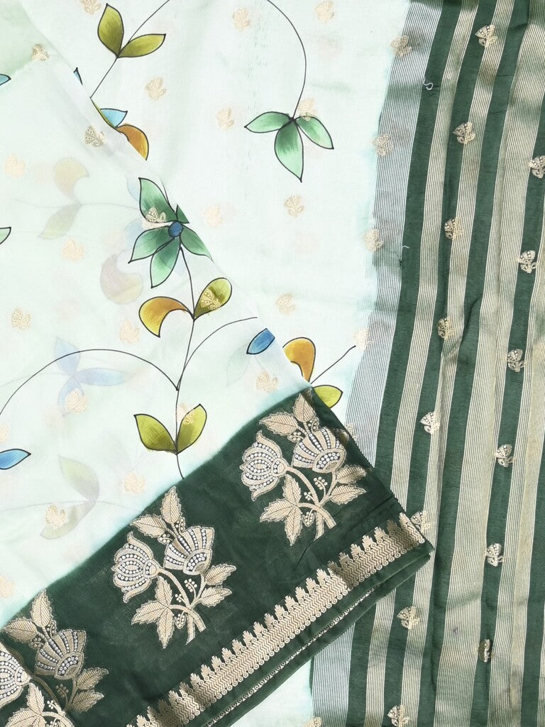 Raw mango fancy saree half white color allover prints & zari border with zari pallu and contrast blouse