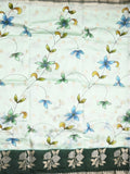 Raw mango fancy saree half white color allover prints & zari border with zari pallu and contrast blouse