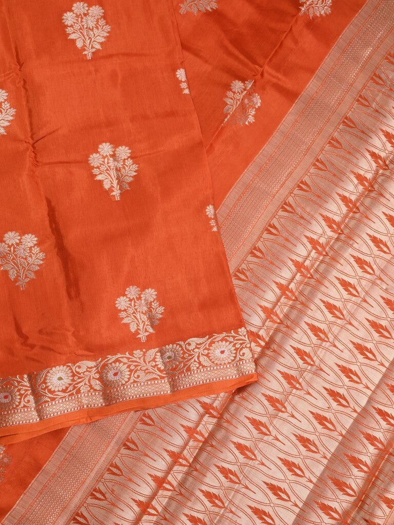 Raw mango fancy saree orange color allover zari motifs & zari border with zari pallu and brocade blouse