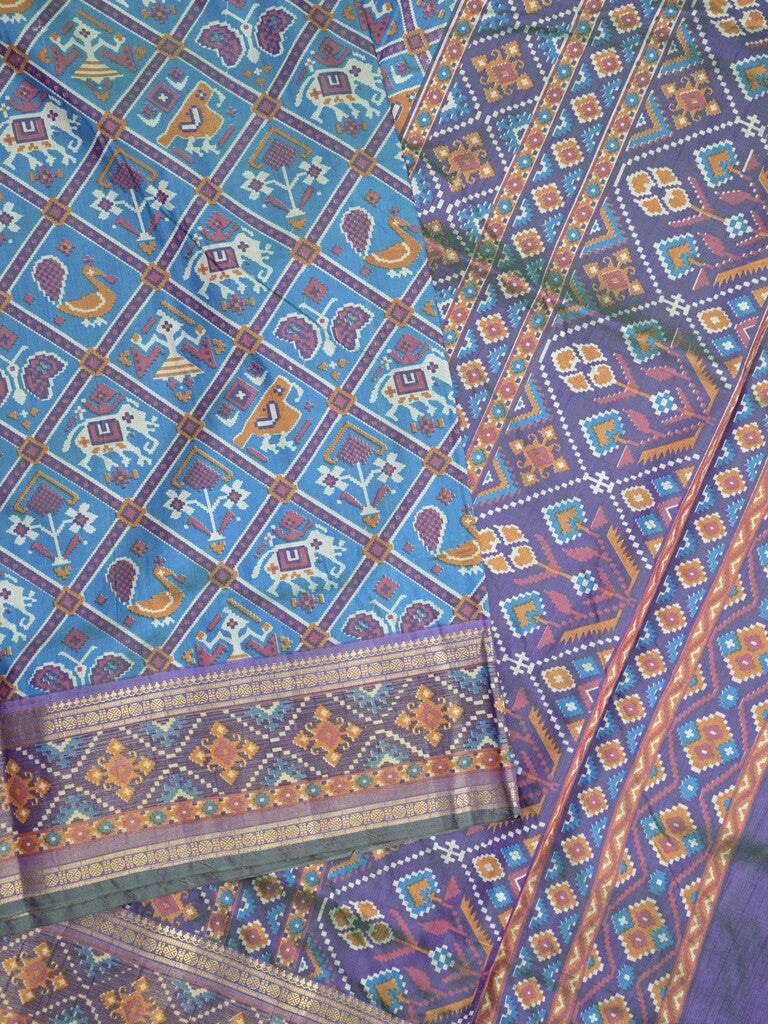 Ikkath fancy saree in navy blue color allover design with zari border & ikkath pallu and plain blouse