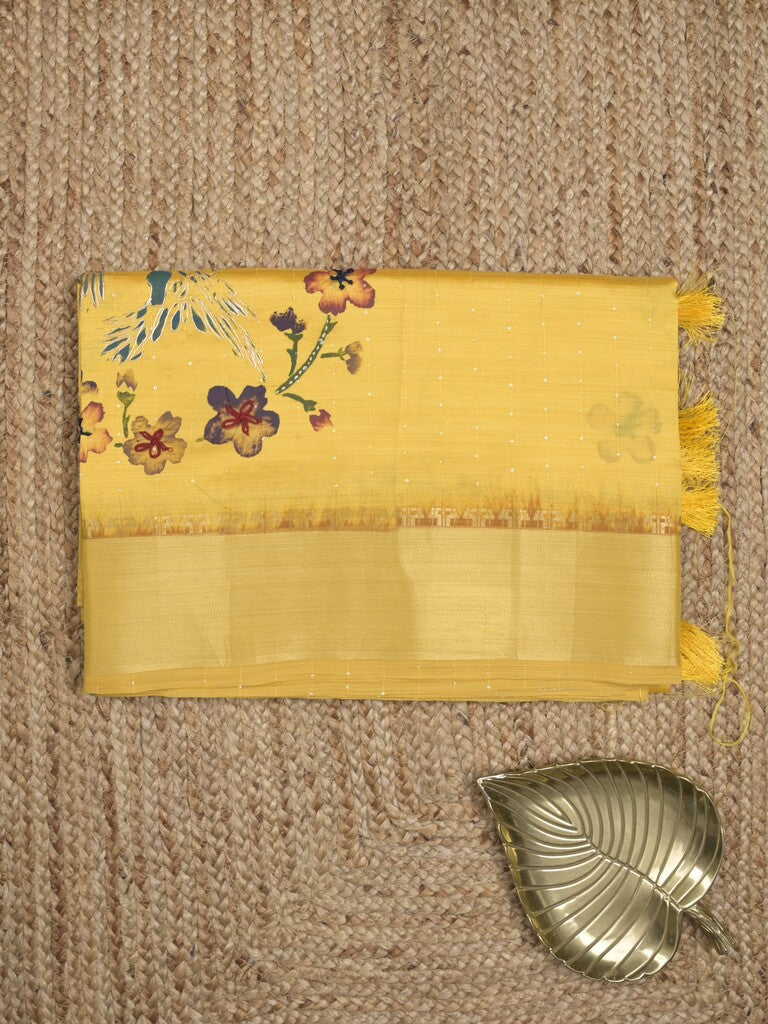 Tussar fancy saree in yellow color allover prints, embroidery & zari border with short zari pallu and blouse