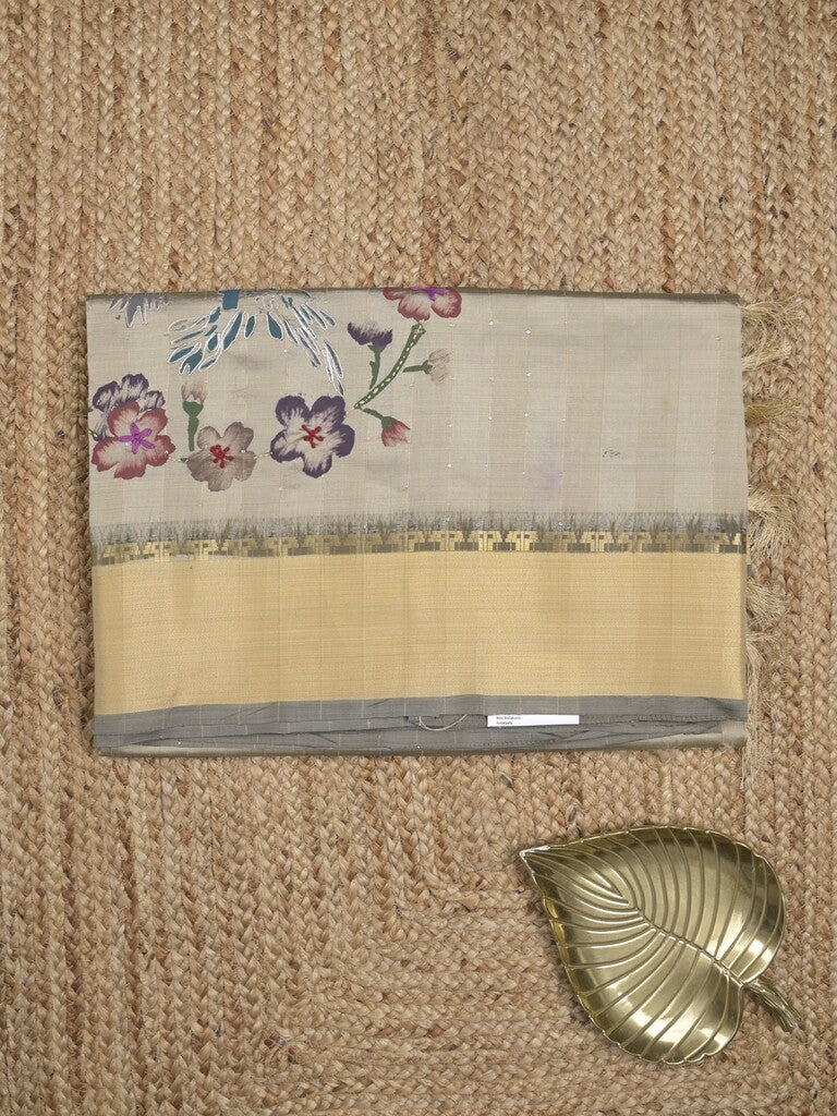 Tussar fancy saree in grey color allover prints, embroidery & zari border with short zari pallu and blouse