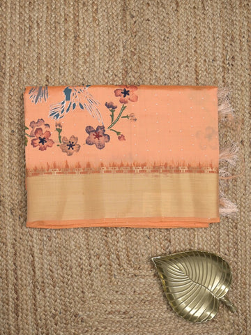 Tussar fancy saree in peach color allover prints, embroidery & zari border with short zari pallu and blouse