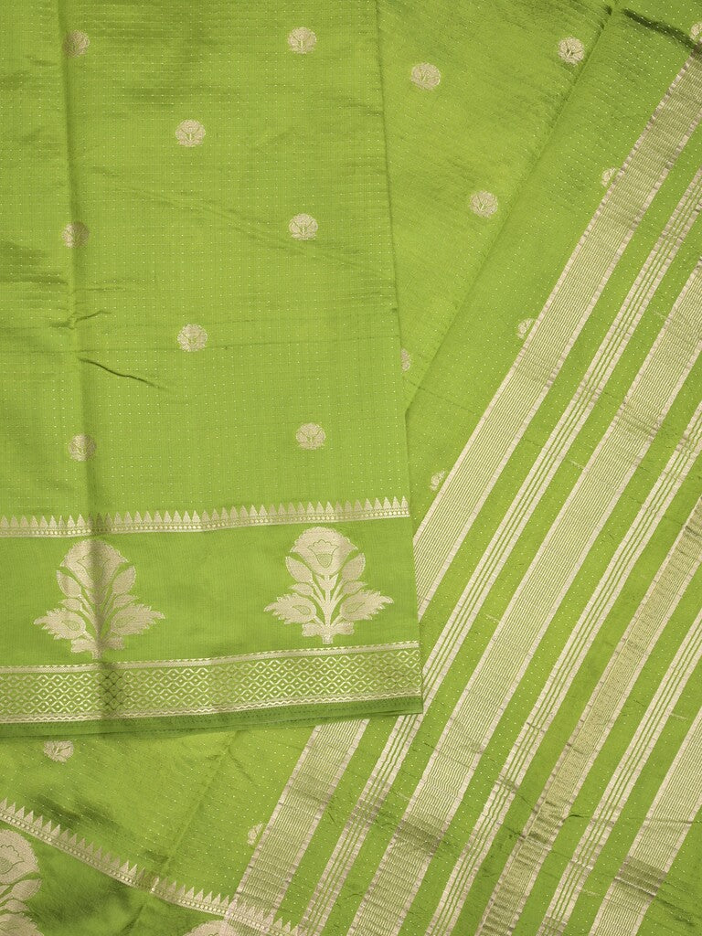 Dupion fancy saree in parrot green color allover zari motifs & zari border with zari pallu and attached blouse