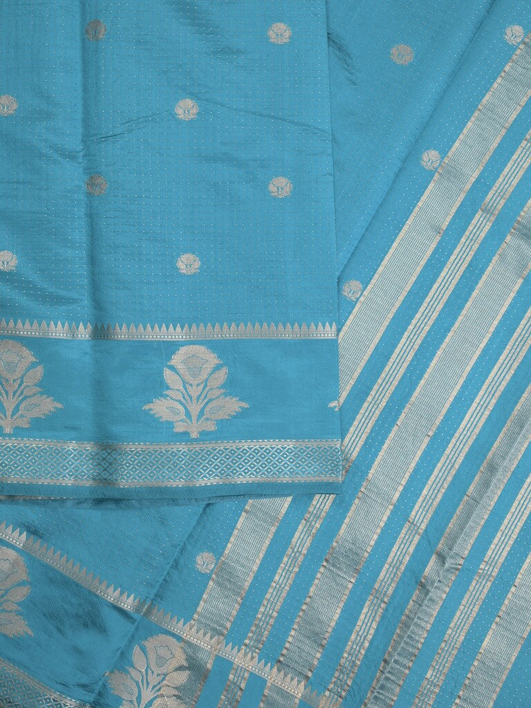 Dupion fancy saree in sky blue color allover zari motifs & zari border with zari pallu and attached blouse