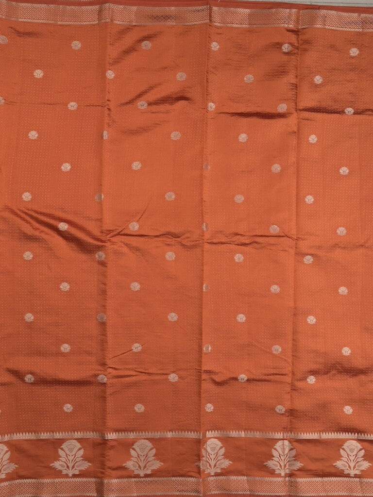 Dupion fancy saree in orange color allover zari motifs & zari border with zari pallu and attached blouse