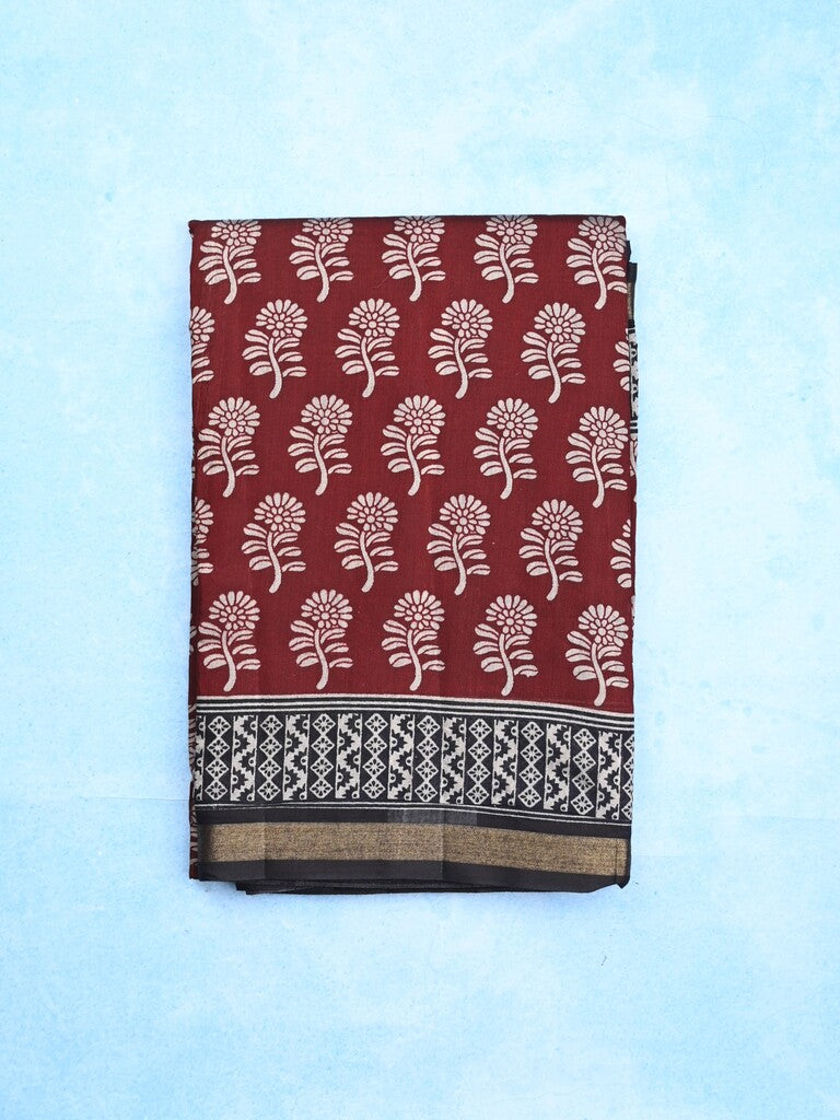 Maheshwari fancy saree maroon color allover prints & printed zari border with contrast pallu and attached blouse