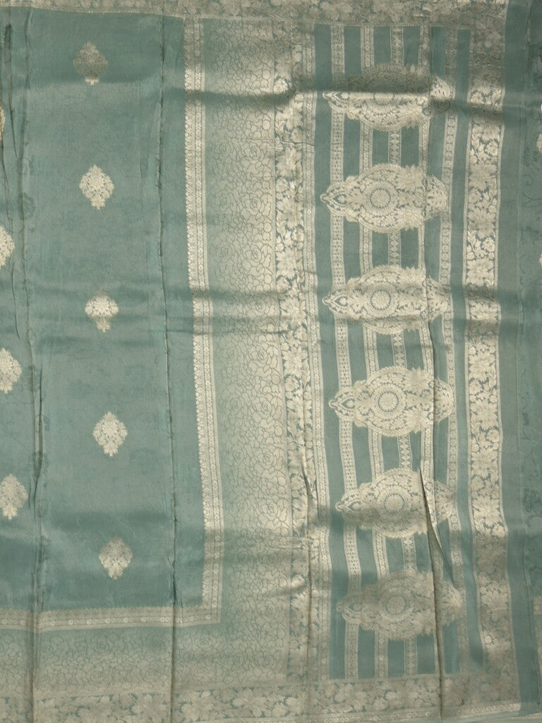 Dola tissue fancy saree grey color allover zari motifs & zari border with rich pallu and plain self blouse
