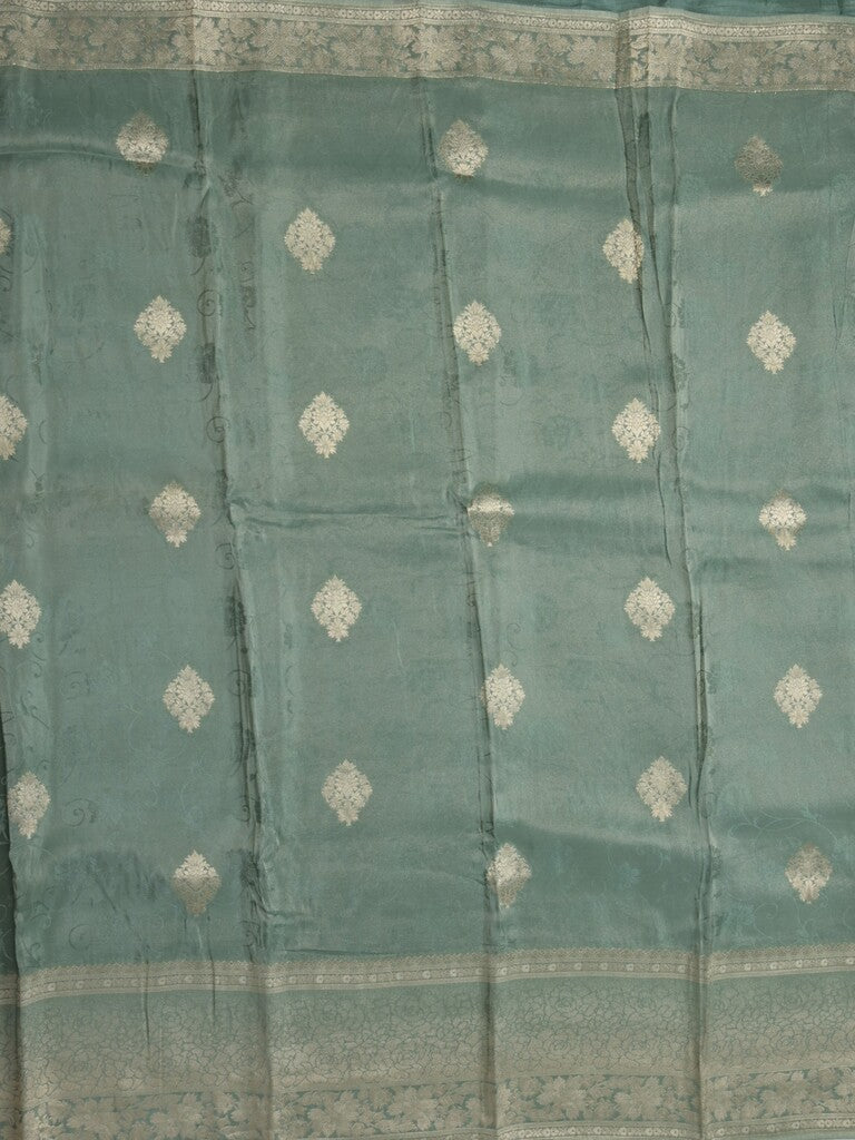 Dola tissue fancy saree grey color allover zari motifs & zari border with rich pallu and plain self blouse