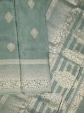 Dola tissue fancy saree grey color allover zari motifs & zari border with rich pallu and plain self blouse