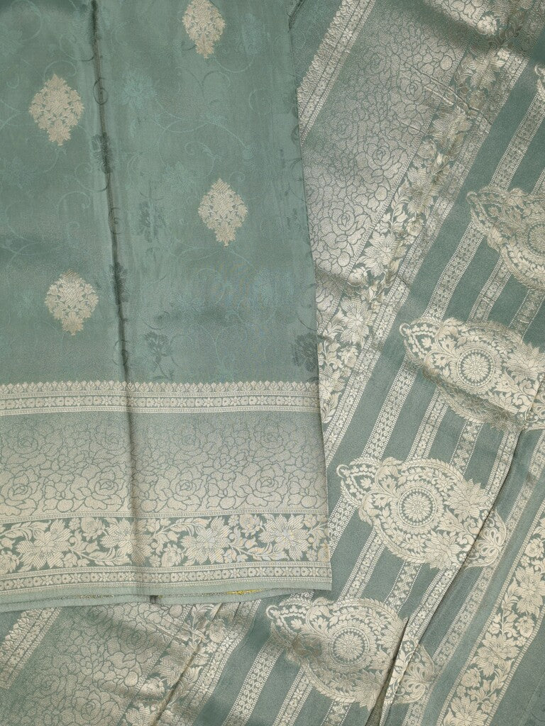 Dola tissue fancy saree grey color allover zari motifs & zari border with rich pallu and plain self blouse
