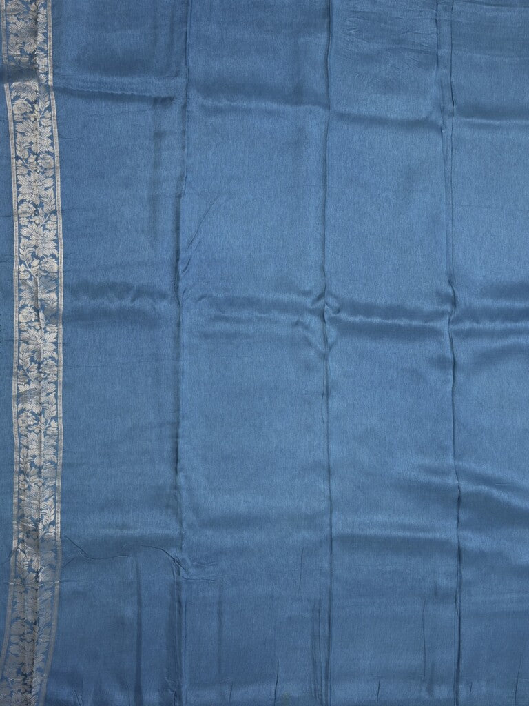 Dola tissue fancy saree light blue color allover zari motifs & zari border with rich pallu and plain self blouse