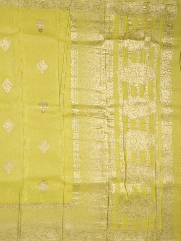 Dola tissue fancy saree lemon yellow color allover zari motifs & zari border with rich pallu and plain self blouse