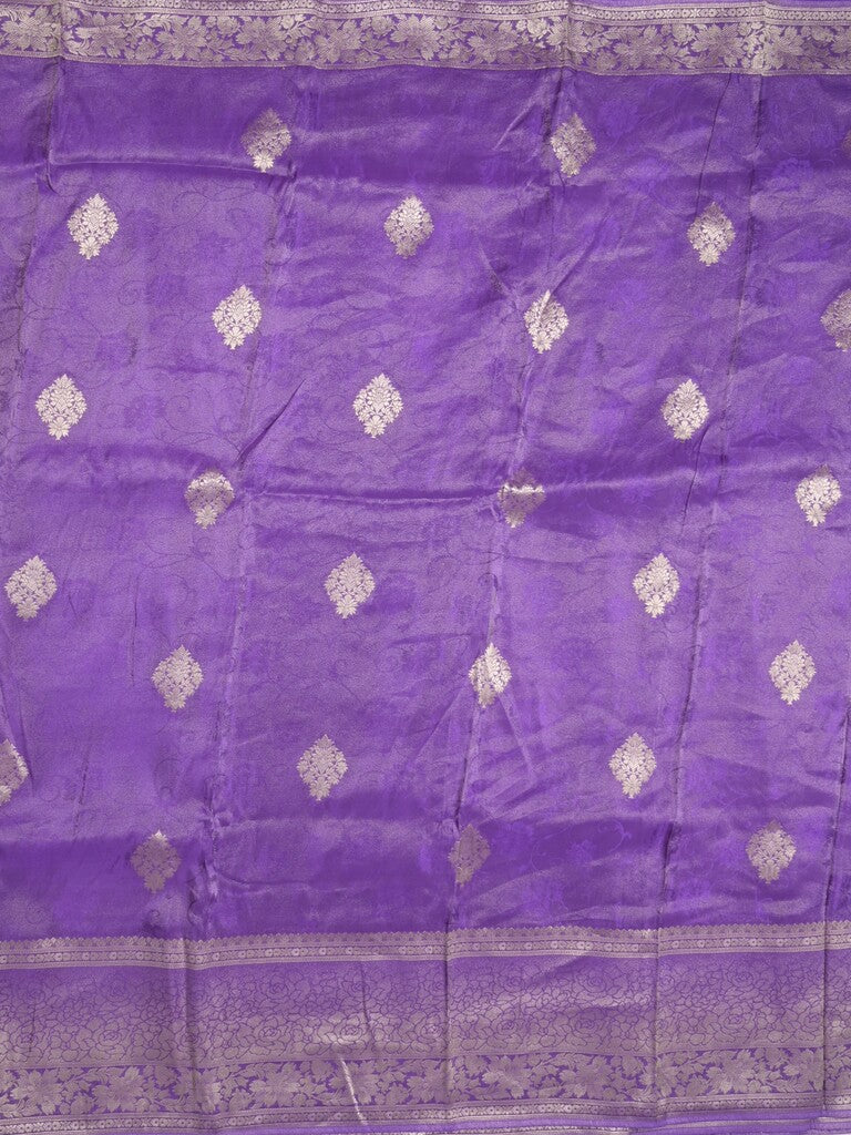 Dola tissue fancy saree purple color allover zari motifs & zari border with rich pallu and plain self blouse