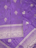 Dola tissue fancy saree purple color allover zari motifs & zari border with rich pallu and plain self blouse