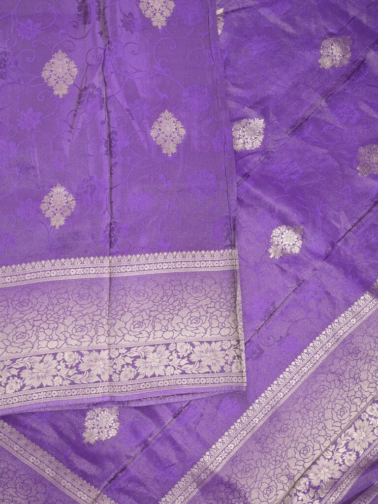 Dola tissue fancy saree purple color allover zari motifs & zari border with rich pallu and plain self blouse