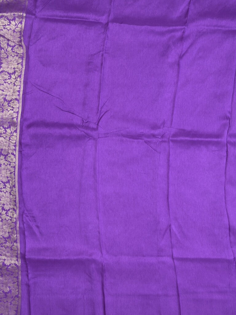 Dola tissue fancy saree purple color allover zari motifs & zari border with rich pallu and plain self blouse