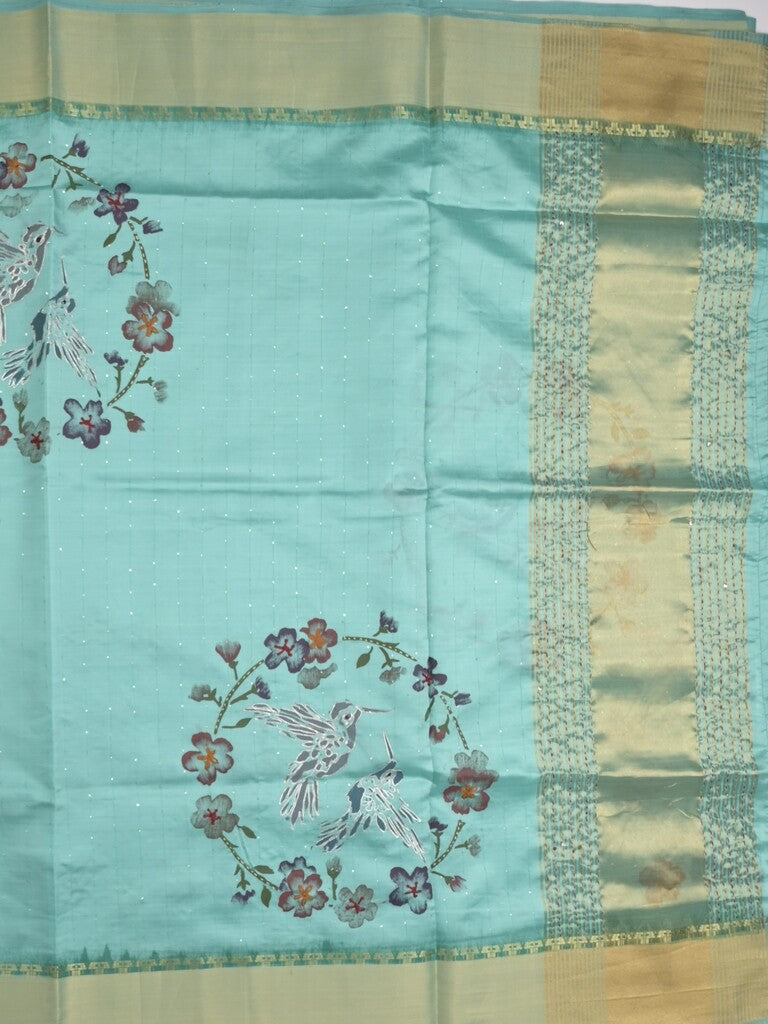 Tussar fancy saree in sky blue color allover prints, embroidery & zari border with short zari pallu and blouse
