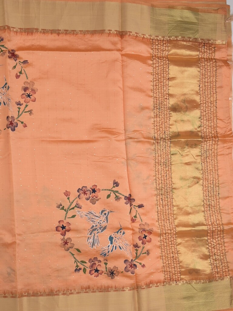 Tussar fancy saree in peach color allover prints, embroidery & zari border with short zari pallu and blouse
