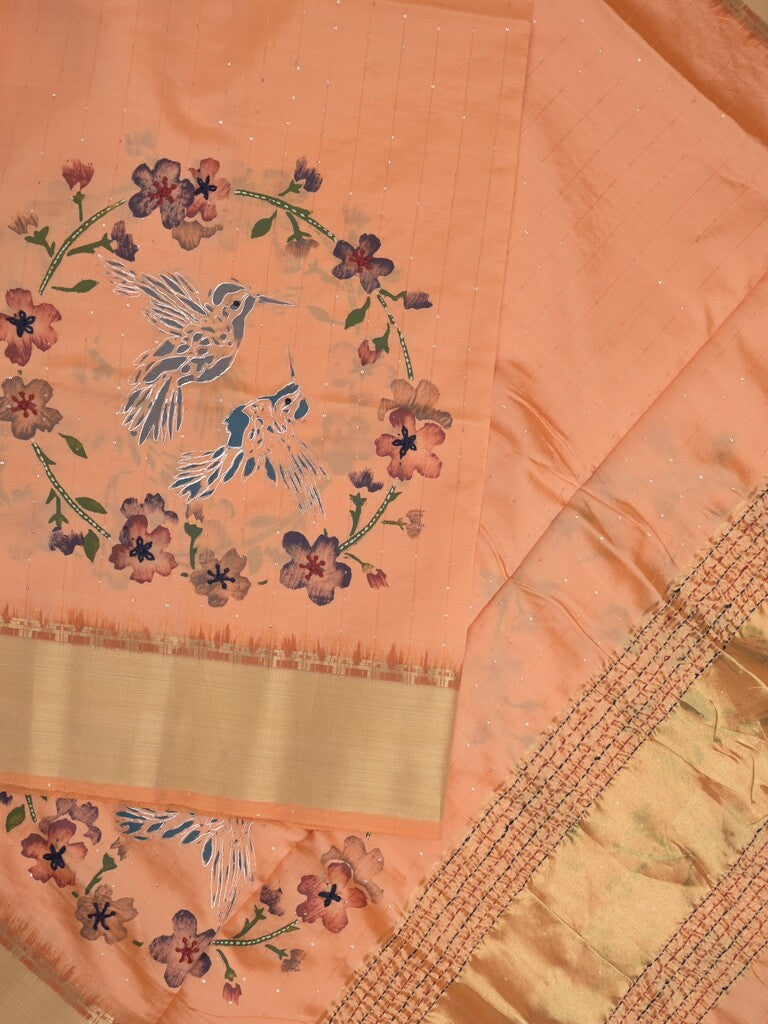 Tussar fancy saree in peach color allover prints, embroidery & zari border with short zari pallu and blouse