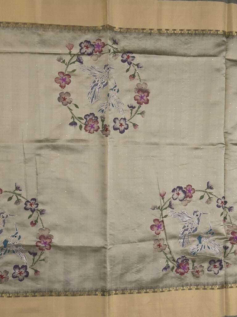 Tussar fancy saree in grey color allover prints, embroidery & zari border with short zari pallu and blouse