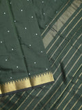 Chanderi fancy saree dark green color allover zari motifs & zari border with zari pallu and plain blouse