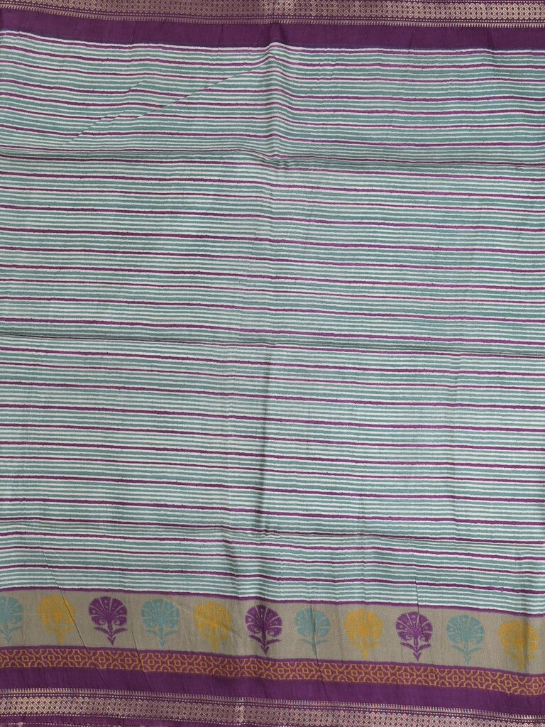 Tussar fancy saree in bluish grey color allover stripes & zari border with contrast pallu and blouse