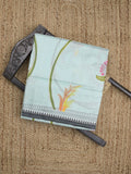 Mangalagiri pattu saree in pastel blue color allover prints and temple border with contrast plain blouse