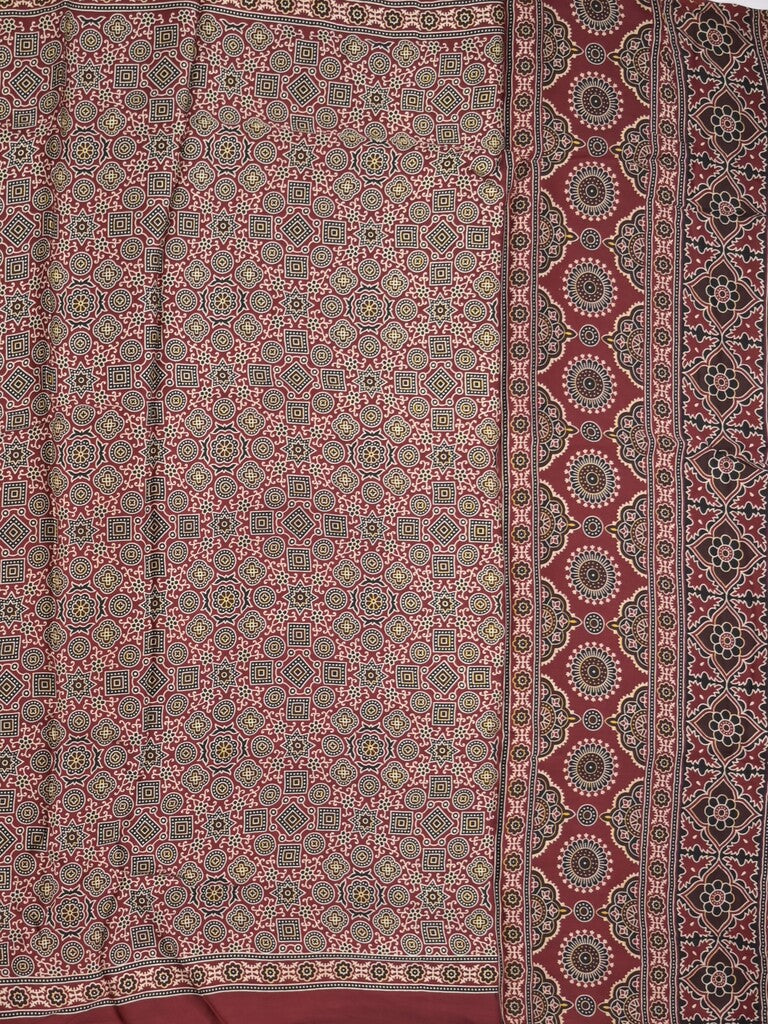 Modal silk fancy saree maroon color allover prints & small kaddi border with zari pallu and printed blouse