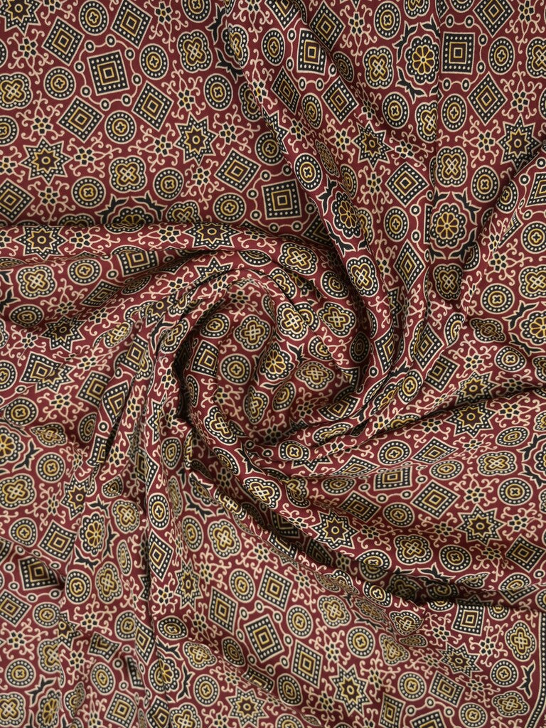 Modal silk fancy saree maroon color allover prints & small kaddi border with zari pallu and printed blouse