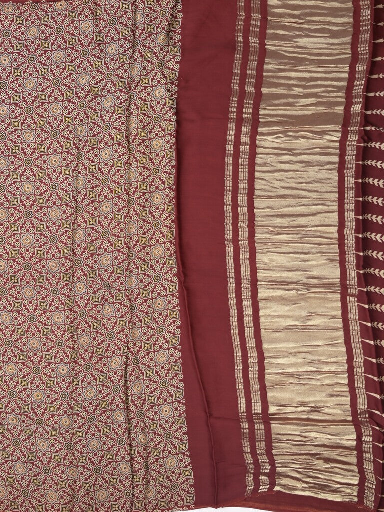 Modal silk fancy saree maroon color allover prints & small kaddi border with zari pallu and printed blouse