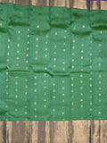 Kanchi pattu saree peacock green color allover zari motifs & kanchi border with rich pallu and contrast plain blouse